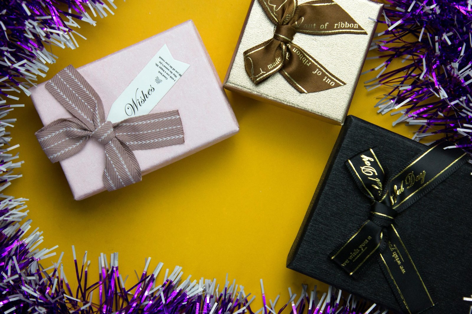 a couple of wrapped presents sitting on top of a table